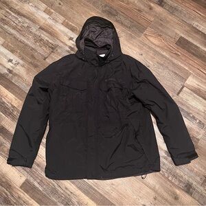 Columbia black nylon jacket with button and zipper closure